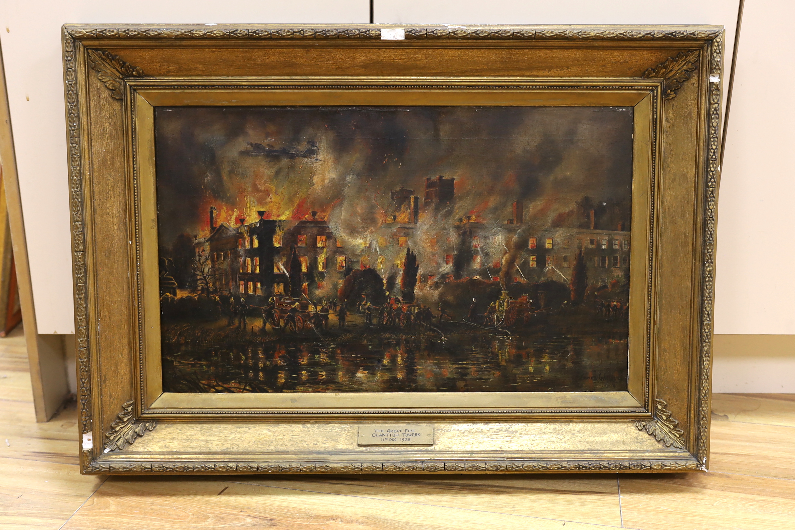 Xavier Willis (20th. C), oil on canvas, 'The Great Fire Olantigh Towers 11th Dec. 1903', signed and dated 1904, applied plaque to the frame, 39 x 64cm